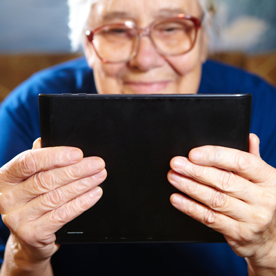 elderly lady on her tablet